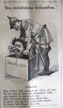 Den socialistiska trollgubben. Bildskämt om den tyske rikskanslern Bismarcks aggressiva politik mot socialismen i Söndags-Nisse – Illustreradt Veckoblad för Skämt, Humor och Satir, nr 40, den 6 oktober 1878