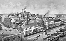 Grafiskt verk över Ludvigsbergs mekaniska verkstad från sjösidan med fabrikörsbostaden Villa Ludvigsberg på höjden.