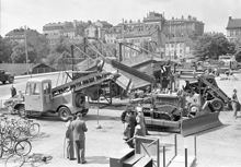 Medborgarplatsens västra del mot norr. I bakgrunden Södra Latin(läroverket). Utställning av vägmaskiner på torget