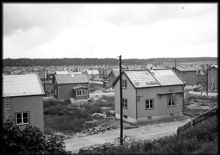 Enskede småstugeområde under byggnad på Enskedefältet från Enskedehöjden