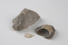 Slagen flinta från gravfält i Akalla, Spånga 134:1.