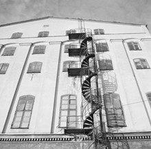 Tantogatan 45. Tanto Sockerbruk före rivning. Spiraltrappa på fabriksfasaden. Nu Tantogatan 73, kv. Kulltorp