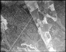 Flygbild från ballong från ca 500 m höjd - Ballon Captive - över trakten kring Aspudden. Släplinan når marken vid dagens Pilgrimsvägen i höjd med Fågeltorget i Aspudden.