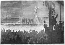 Från Karl XII:s statys aftäckningsfest i Stockholm den 30 november 1868. 2. Upsala studentkårs fackeltåg samlat kring kungastoden. Tecknadt af K. A. Ekvall. Teckning i Ny Illustrerad Tidning, nr 50 den 12 december 1868