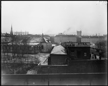 Helgeandsholmen från Lejonbacken. Norrbro t.h