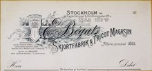 Brevhuvud. E. Bégats Skjortfabrik & Tricot Magasin