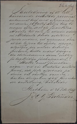 Svart snirklig text på gulnat papper